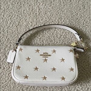 Coach White Wristlet with Gold Stars